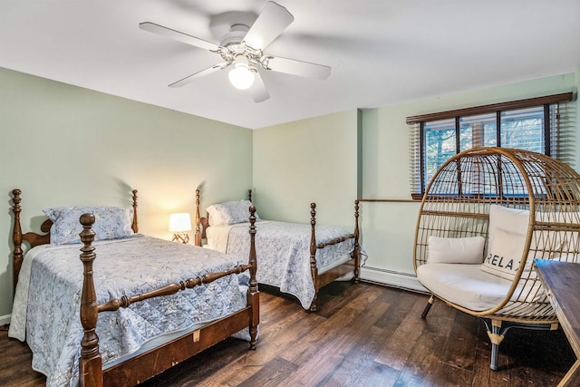 bedroom featuring a baseboard radiator, a ceiling fan, and wood finished floors