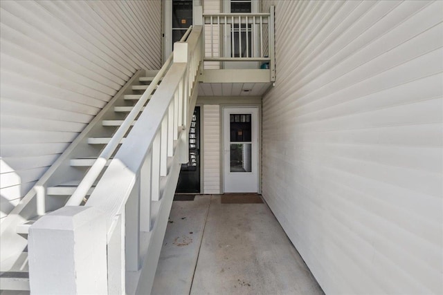 entrance to property featuring a balcony