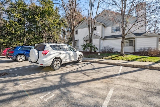 view of uncovered parking lot