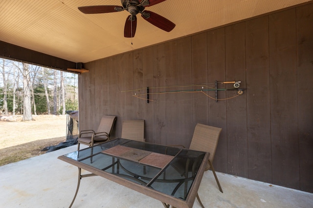 view of patio featuring ceiling fan