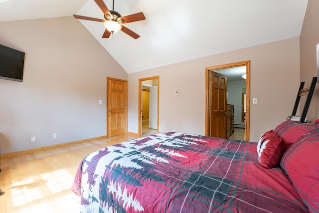 bedroom featuring high vaulted ceiling, light wood-style floors, a ceiling fan, and a baseboard heating unit
