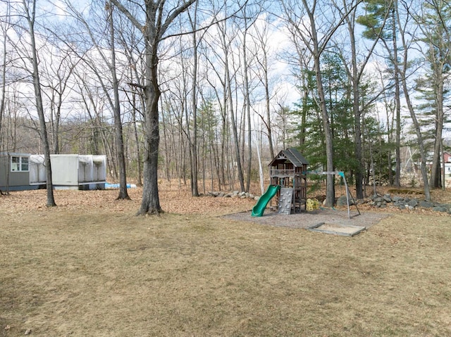 view of yard featuring a playground