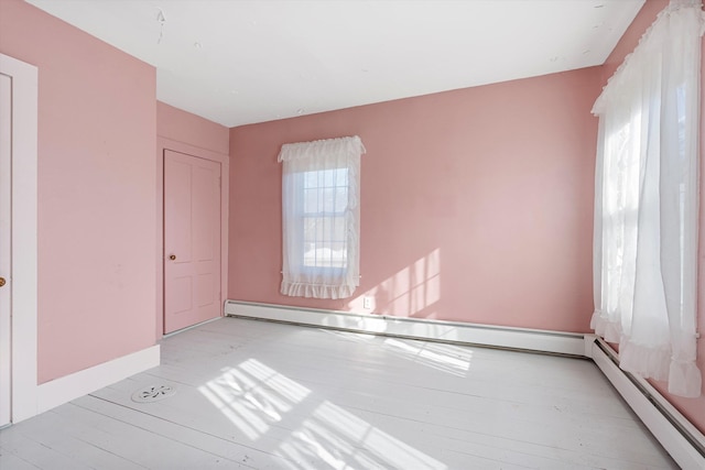 33 Bunker Hill Rd, Auburn, NH 03032 - spare room featuring a baseboard radiator and baseboards