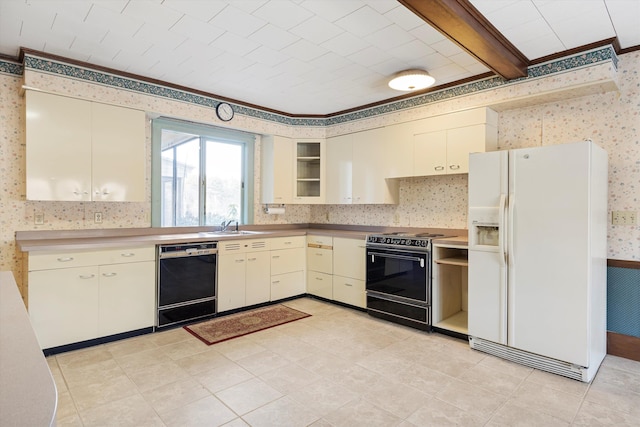 33 Bunker Hill Rd, Auburn, NH 03032 - kitchen with white refrigerator with ice dispenser, black dishwasher, wallpapered walls, electric range oven, and cream cabinets