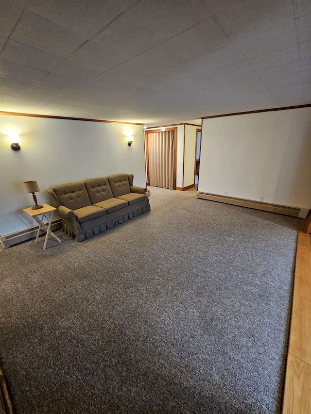 living area featuring baseboard heating, baseboards, and carpet