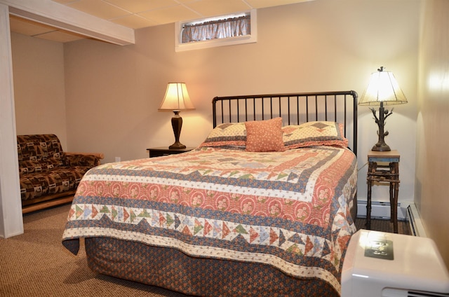 bedroom featuring a baseboard radiator and carpet