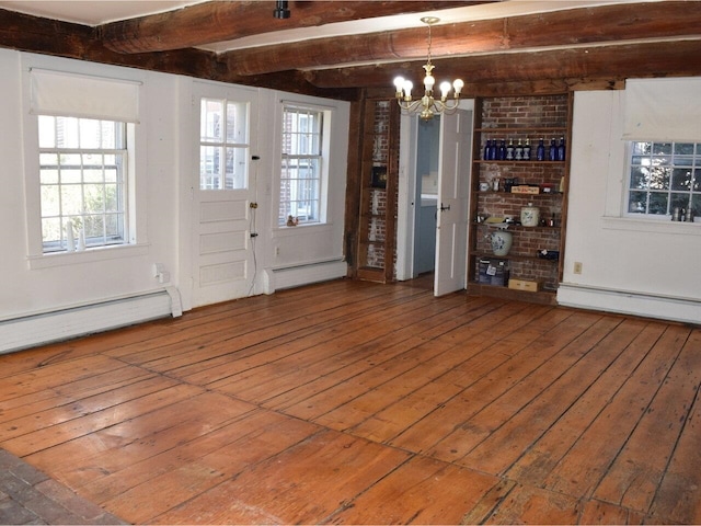 1419 Stonebridge Rd, Georgia, VT 05468 - unfurnished dining area featuring beam ceiling, a healthy amount of sunlight, a chandelier, hardwood / wood-style flooring, and a baseboard radiator