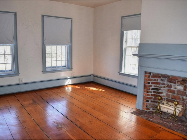 1419 Stonebridge Rd, Georgia, VT 05468 - unfurnished living room featuring hardwood / wood-style flooring and a wealth of natural light