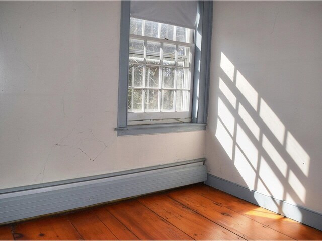 1419 Stonebridge Rd, Georgia, VT 05468 - unfurnished room featuring hardwood / wood-style floors and a healthy amount of sunlight