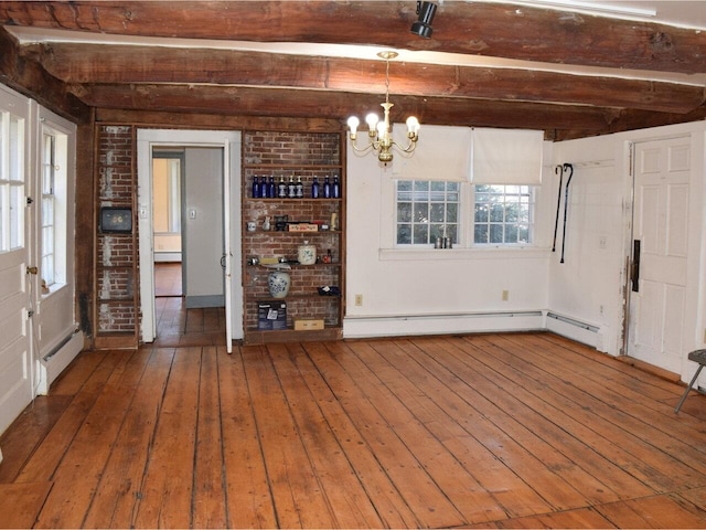 1419 Stonebridge Rd, Georgia, VT 05468 - unfurnished dining area with beamed ceiling, an inviting chandelier, hardwood / wood-style floors, and a baseboard heating unit