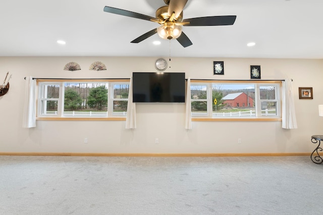 interior space featuring baseboards, recessed lighting, and ceiling fan