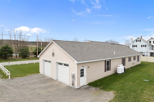 detached garage with fence