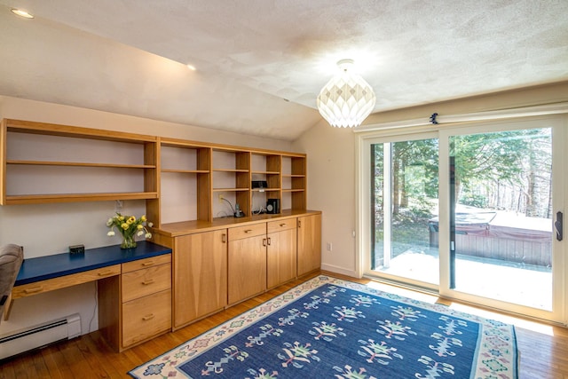 34 Ridge Rd, Jackson, NH 03846 - office with baseboard heating, light wood-style floors, lofted ceiling, a textured ceiling, and baseboards