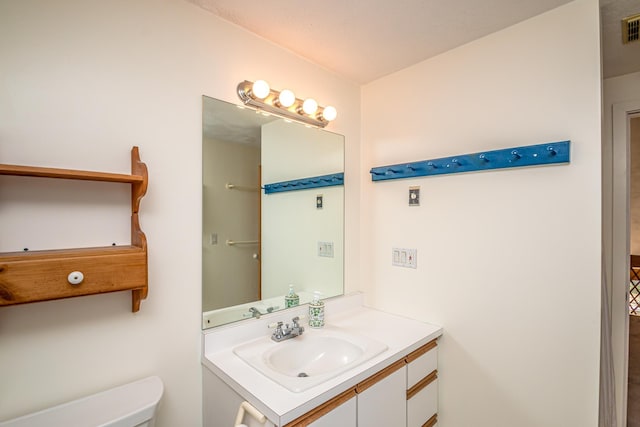 34 Ridge Rd, Jackson, NH 03846 - bathroom with vanity and toilet