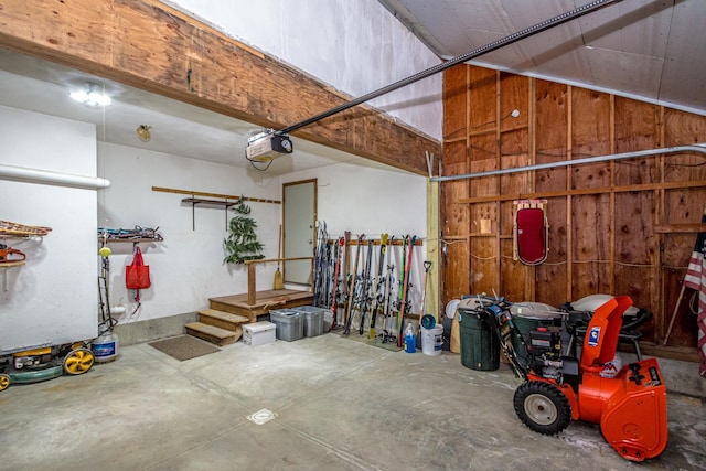 34 Ridge Rd, Jackson, NH 03846 - garage featuring a garage door opener and wooden walls