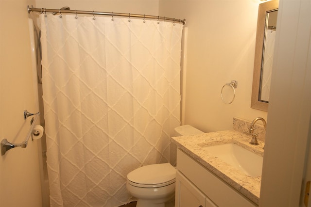 30 Pond St Unit 11, Ludlow, VT 05149 - full bathroom with a shower with curtain, vanity, and toilet