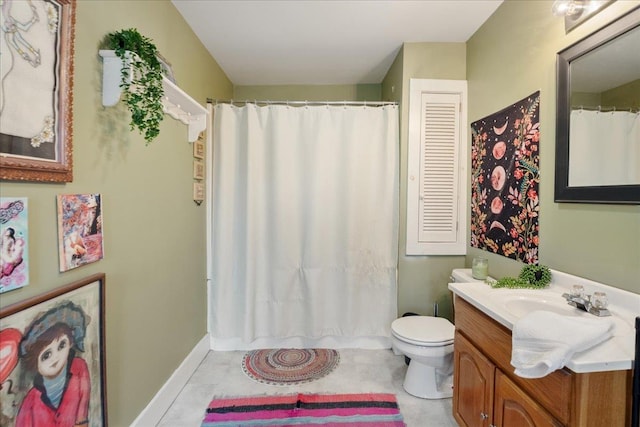 full bath with toilet and vanity