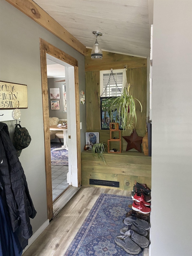 interior space with lofted ceiling and wood finished floors