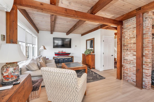 living room with wooden ceiling, beamed ceiling, and light wood-style flooring