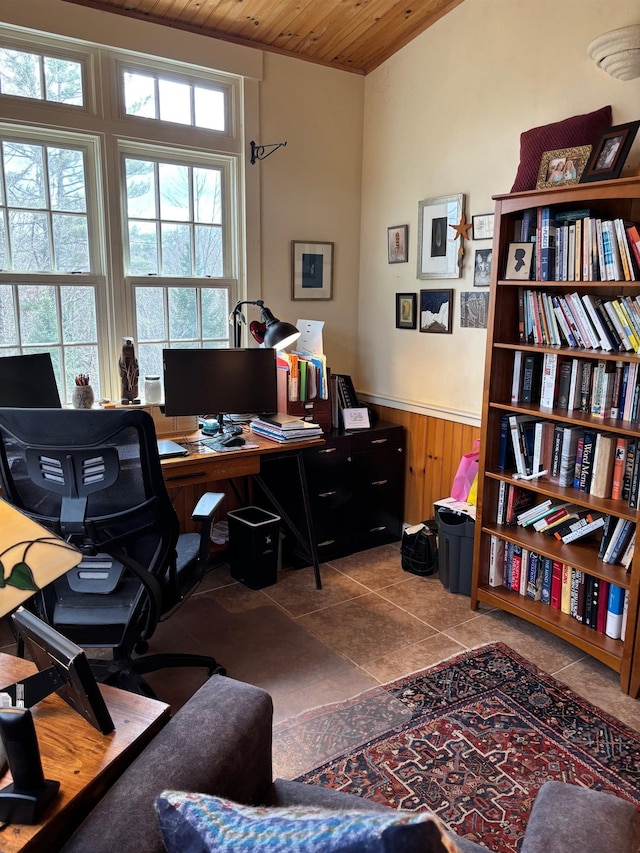 office with wood ceiling, tile patterned floors, a wainscoted wall, and wood walls
