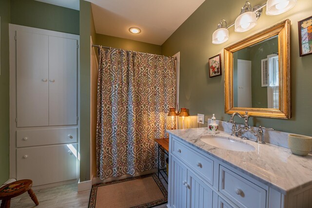 3360 Dorset W Rd, Dorset, VT 05251 - bathroom with a shower with curtain, wood finished floors, and vanity
