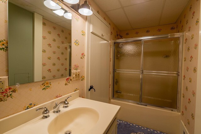 3360 Dorset W Rd, Dorset, VT 05251 - full bath featuring wallpapered walls, vanity, and bath / shower combo with glass door