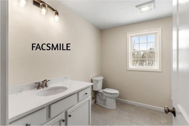 102 Laurel Rd Unit 30, Hooksett, NH 03106 - bathroom with toilet, vanity, baseboards, and tile patterned flooring
