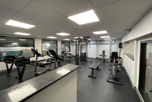 135 E Mountain Rd Unit 1F7, Killington, VT 05751 - exercise room featuring a drop ceiling and baseboards