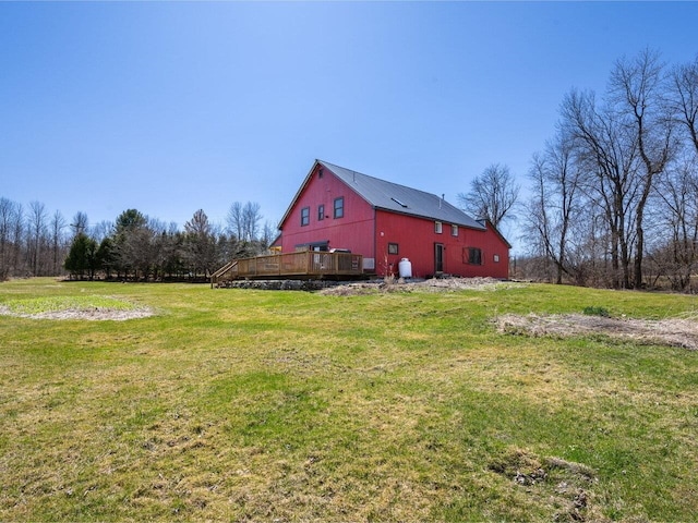 view of yard featuring a wooden deck