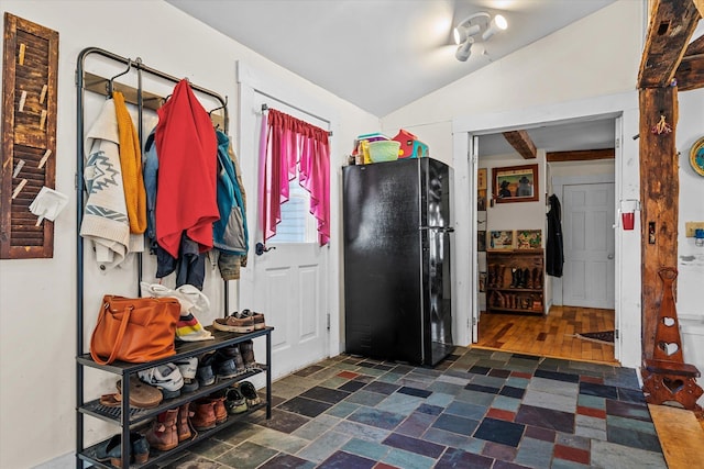 mudroom with lofted ceiling