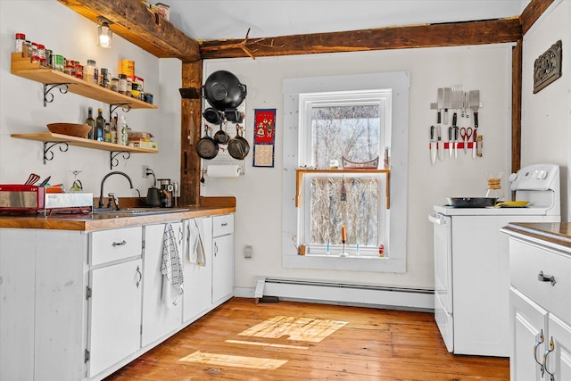 bar with baseboard heating, a sink, light wood-style floors, indoor wet bar, and range
