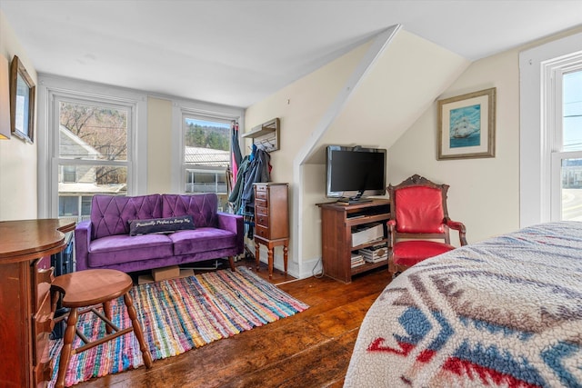 bedroom with wood finished floors