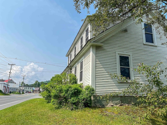 165 N Main St, Rochester, VT 05767 - view of side of home with a lawn
