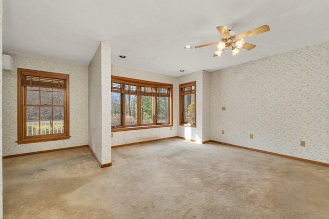 11 Harvest Run, Gilford, NH 03249 - carpeted empty room featuring a ceiling fan, wallpapered walls, and baseboards