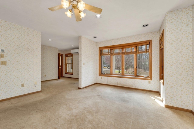 11 Harvest Run, Gilford, NH 03249 - unfurnished room featuring ceiling fan, plenty of natural light, carpet flooring, and wallpapered walls