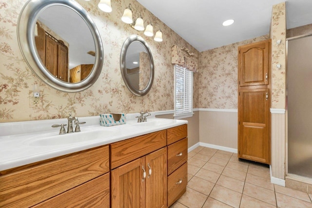 11 Harvest Run, Gilford, NH 03249 - full bathroom with double vanity, wallpapered walls, tile patterned flooring, and a sink