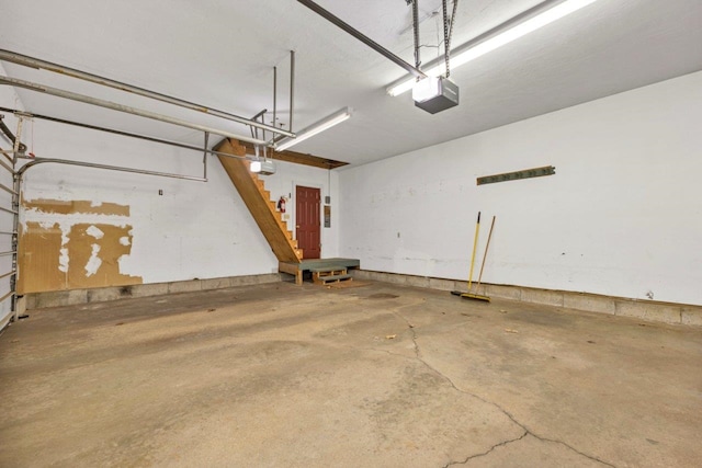 11 Harvest Run, Gilford, NH 03249 - garage featuring a garage door opener