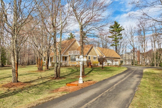 11 Harvest Run, Gilford, NH 03249 - view of front of house featuring a front yard