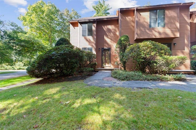 1 Dunvegan Woods Dr, Hampton, NH 03842 - view of front of house with a front yard