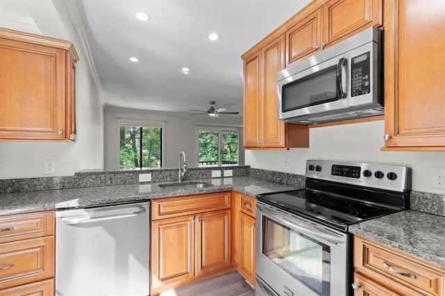 1 Dunvegan Woods Dr, Hampton, NH 03842 - kitchen featuring recessed lighting, stainless steel appliances, dark stone countertops, a sink, and ceiling fan