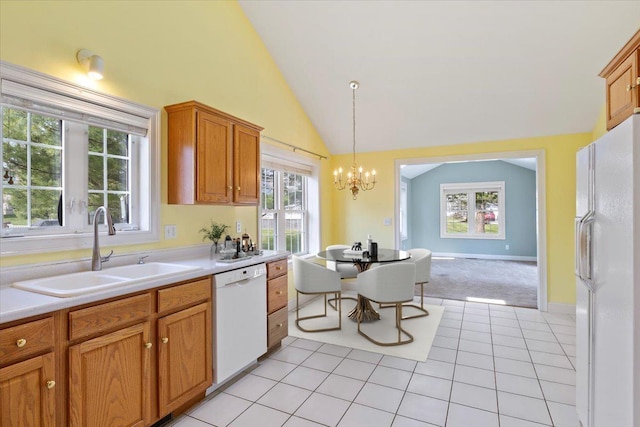 23 Hampton Mdws, Hampton, NH 03842 - kitchen with a sink, a notable chandelier, white appliances, pendant lighting, and light countertops