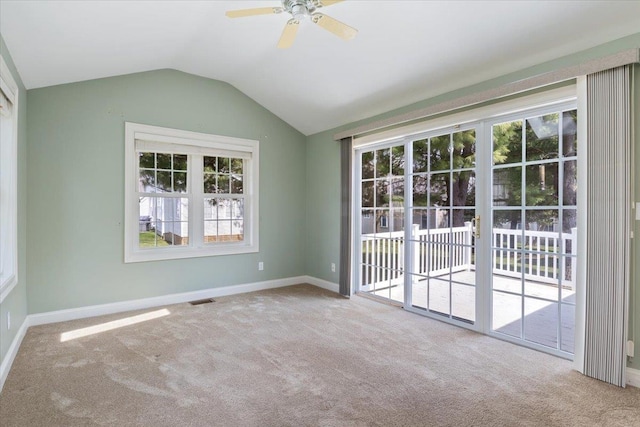 23 Hampton Mdws, Hampton, NH 03842 - carpeted spare room with vaulted ceiling, visible vents, baseboards, and ceiling fan