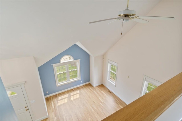 23 Hampton Mdws, Hampton, NH 03842 - additional living space with a ceiling fan, vaulted ceiling, a healthy amount of sunlight, and light wood finished floors