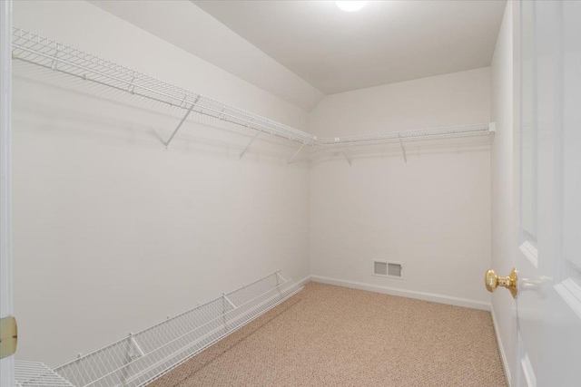 23 Hampton Mdws, Hampton, NH 03842 - walk in closet featuring carpet flooring and visible vents