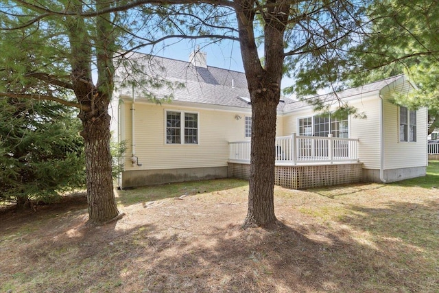 23 Hampton Mdws, Hampton, NH 03842 - exterior space with a shingled roof, a chimney, and a deck