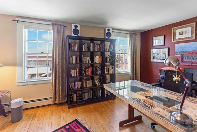 98 Hollis St, Manchester, NH 03101 - office featuring hardwood / wood-style floors and baseboard heating
