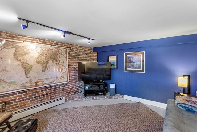 98 Hollis St, Manchester, NH 03101 - living room featuring a baseboard radiator, track lighting, and brick wall