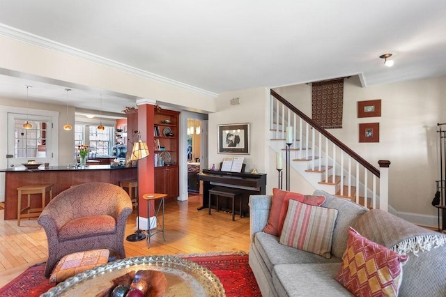98 Hollis St, Manchester, NH 03101 - living area with hardwood / wood-style floors, ornamental molding, and stairway