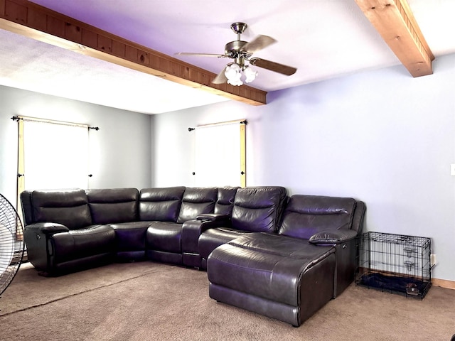 14 Summer St, Northumberland, NH 03582 - living area with plenty of natural light, a ceiling fan, carpet flooring, and beam ceiling