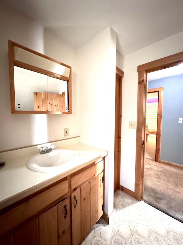 14 Summer St, Northumberland, NH 03582 - bathroom with baseboards and vanity